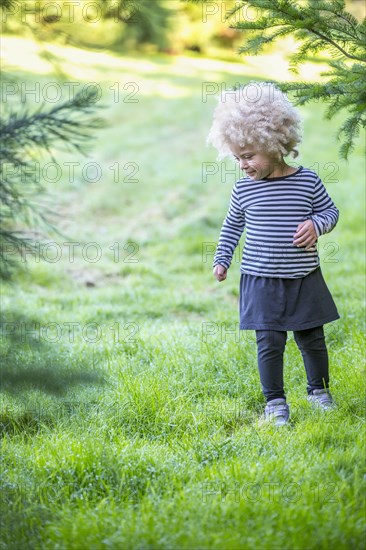 Mixed race girl walking outdoors