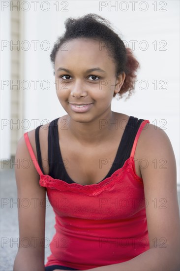 Mixed race girl smiling outdoors