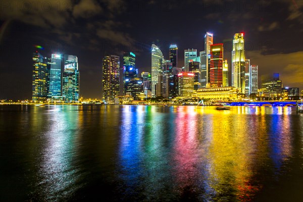 Singapore city skyline lit up at night