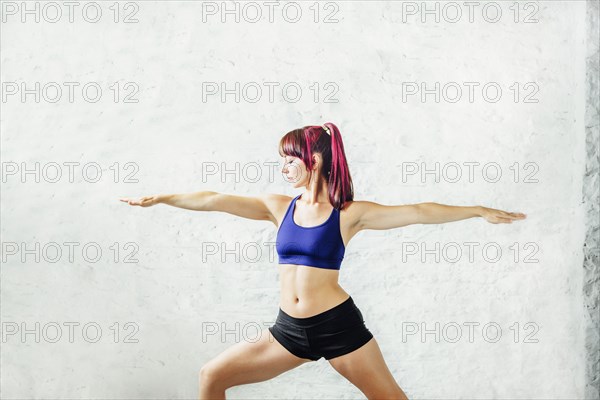 Caucasian woman practicing yoga