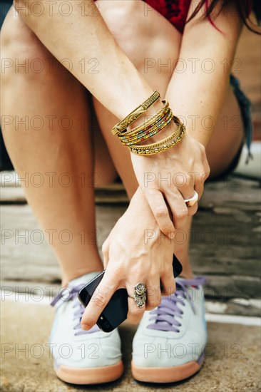 Close up of Caucasian woman holding cell phone