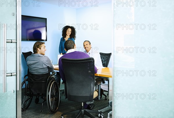 Business people talking in office meeting