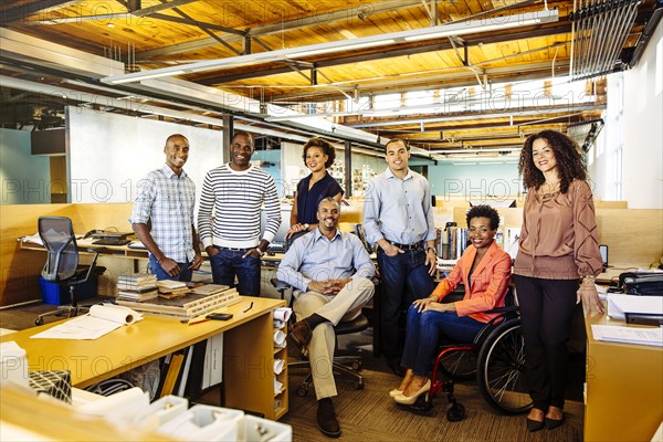 Business people smiling in office