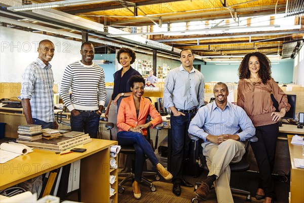 Business people smiling in office