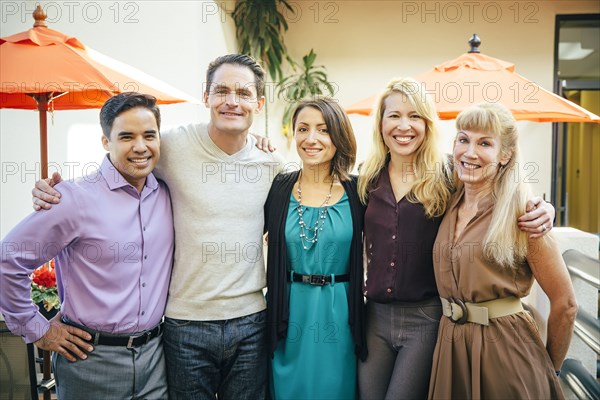 Business people smiling in cafe