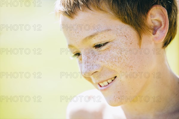 Close up of smiling Caucasian boy