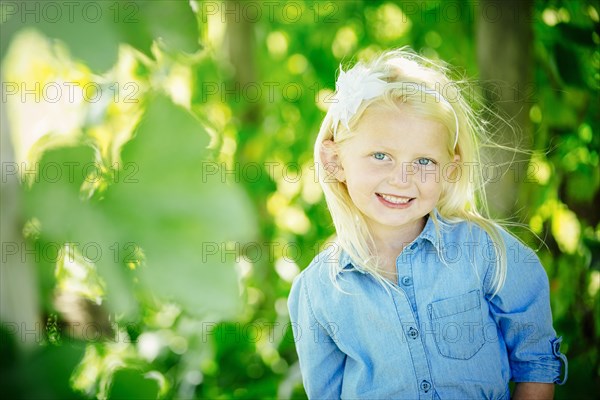 Caucasian girl smiling outdoors