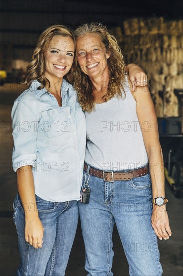 Caucasian mother and daughter hugging