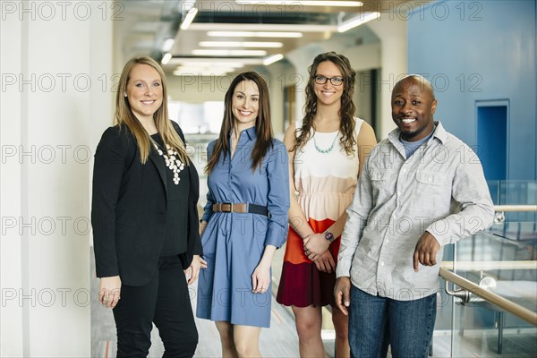 Business people smiling in office