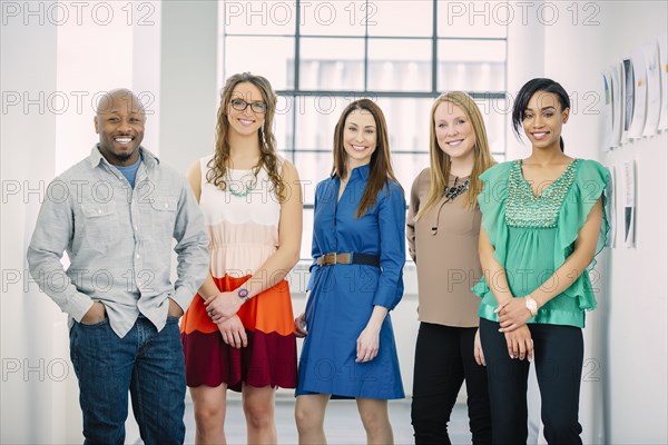 Business people smiling in office