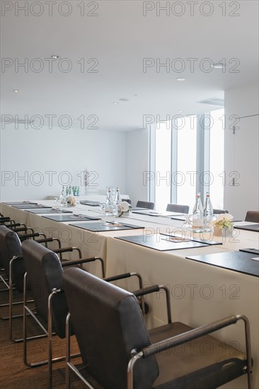 Empty meeting table in conference room