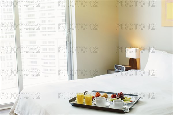 Breakfast tray on hotel bed