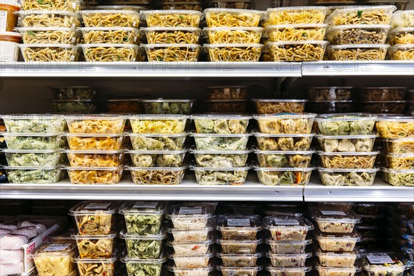 Packaged deli foods on store shelves