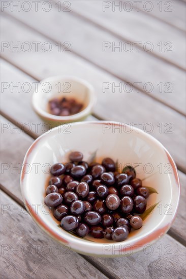 Bowl of olives on table