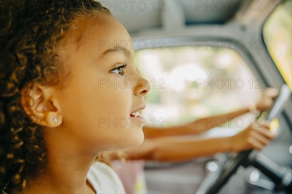 Close up of girl sitting in car