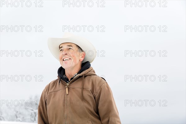 Caucasian farmer smiling outdoors