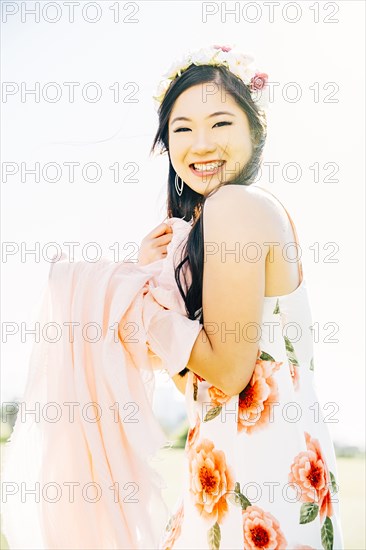 Chinese woman smiling outdoors