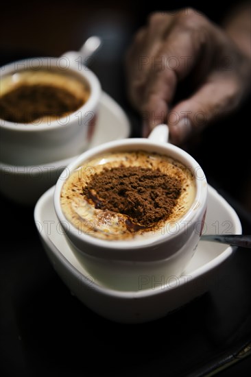 High angle view of spiced cups of coffee