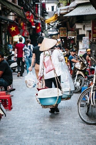 Vendor walking on urban street