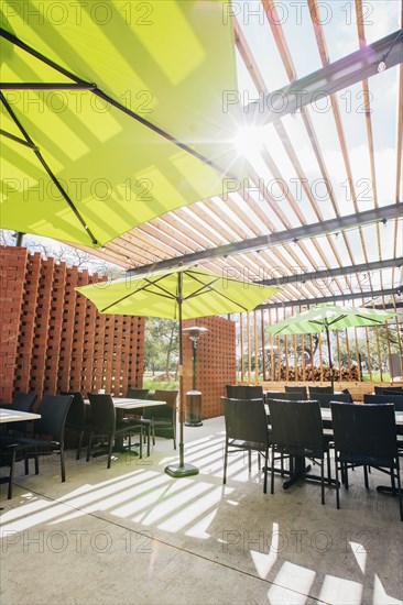 Green umbrellas in restaurant patio