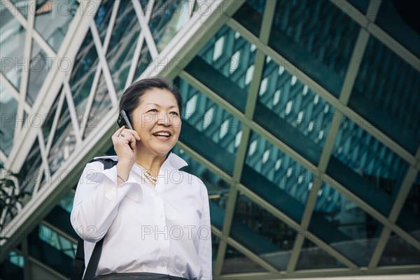 Businesswoman talking on cell phone