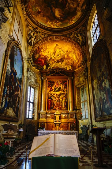 Bible on pedestal in ornate church