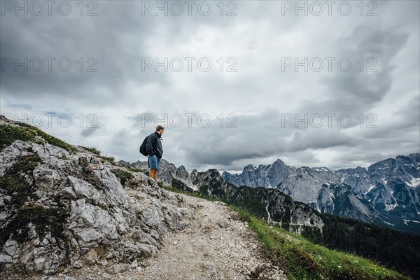 Caucasian man admiring mountain range