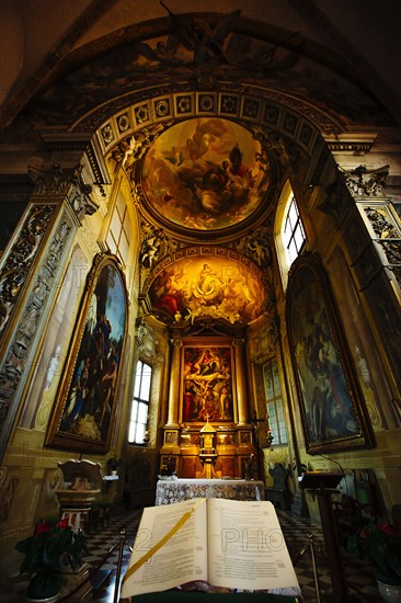 Bible on pedestal in ornate church