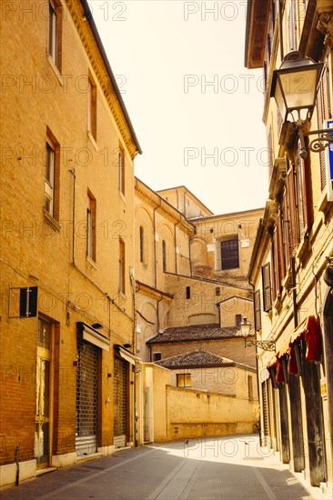 Empty street between buildings