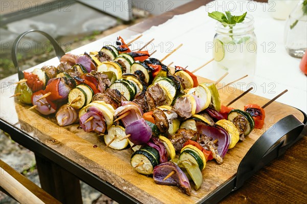 Meat and vegetables on skewers