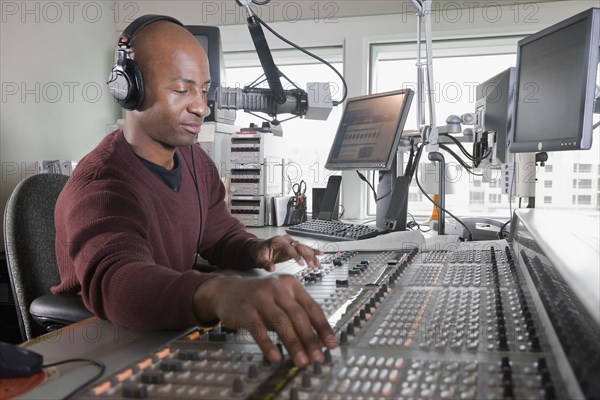 African dj working at radio station