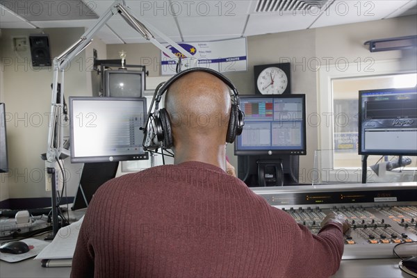 African dj working at radio station