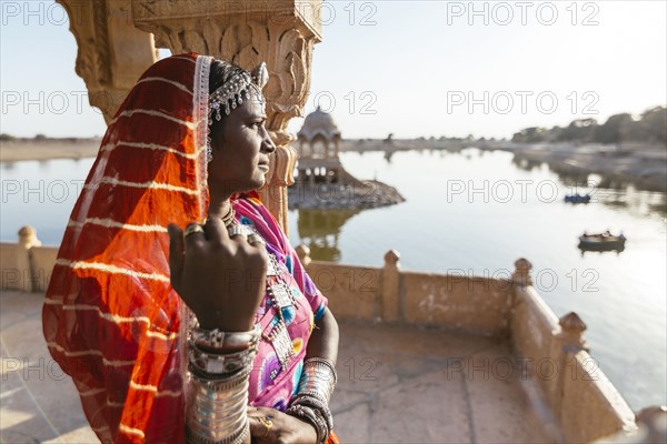 Indian woman admiring view from monument