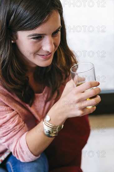 Caucasian woman drinking juice