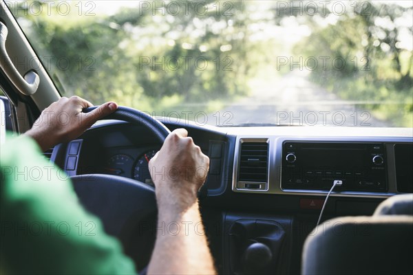 Caucasian man driving car