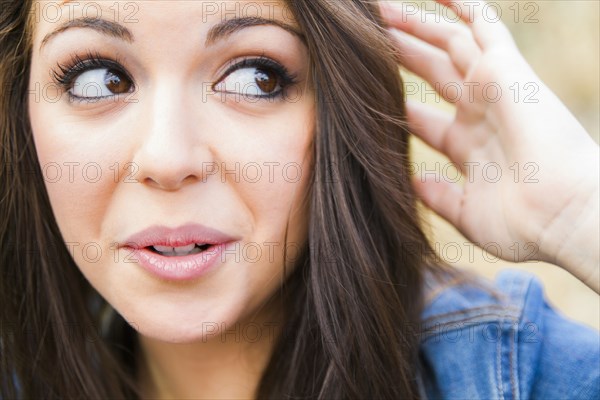 Hispanic woman with quizzical expression