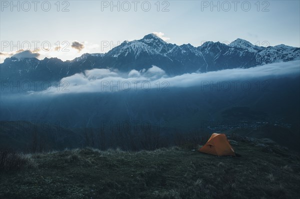 Camping tent in mountain landscape