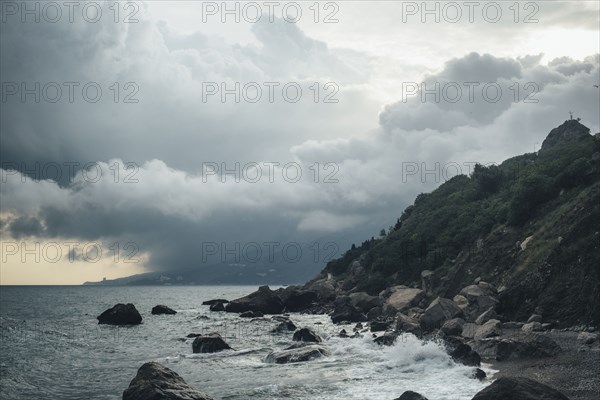 Waves splashing on rocky beach