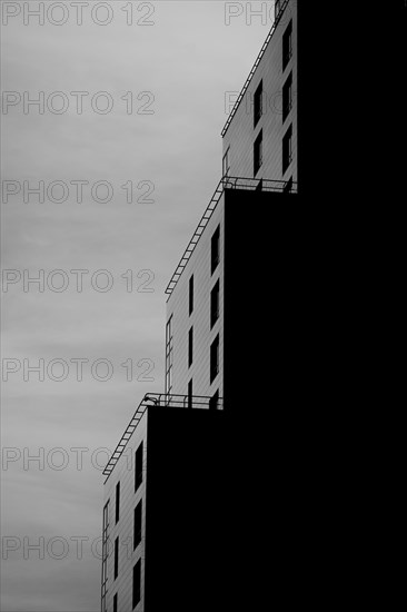 Balconies under cloudy sky