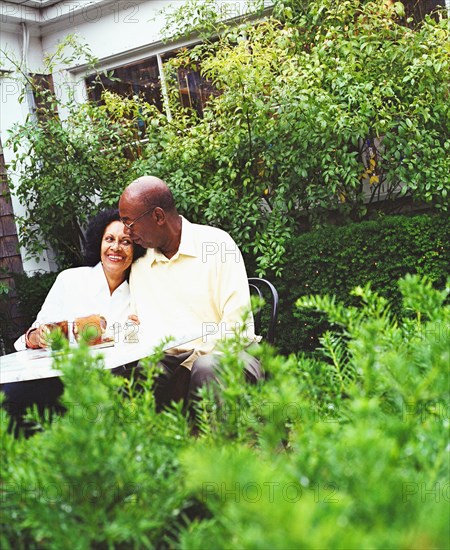 Senior couple relaxing with coffee