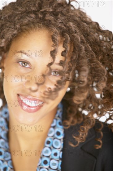 Portrait of woman flipping hair