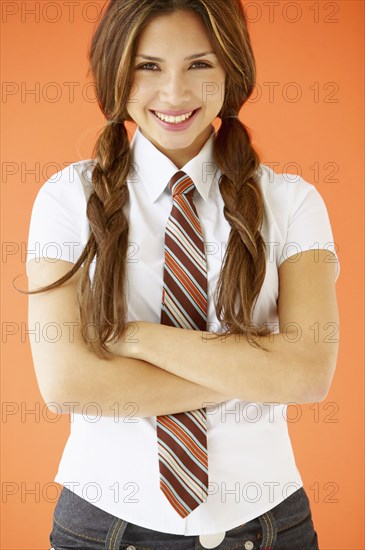 Portrait of teenage girl wearing tie