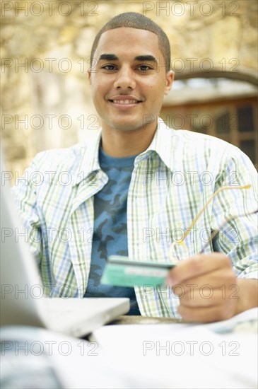 Man holding credit card