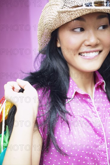 Young woman carrying shopping bags