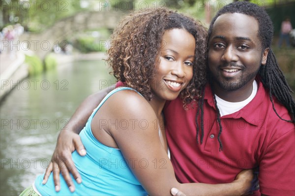 Couple embracing outdoors