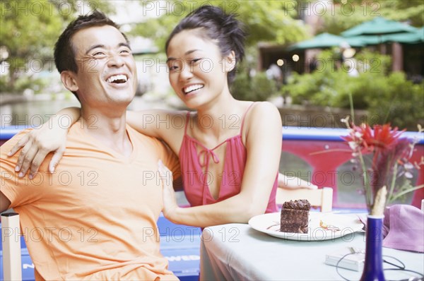 Young couple dining on a boat