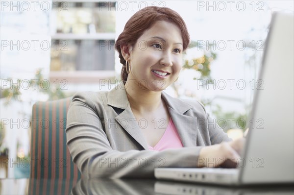 Businesswoman working on a laptop