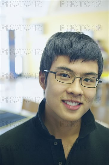 Close up of teenage boy smiling