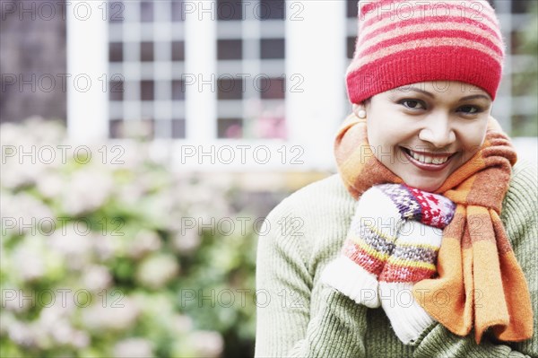 Young woman wearing a scarf outdoors