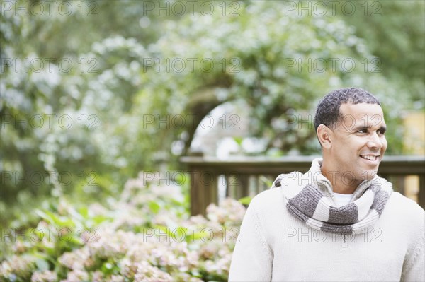 Man wearing a scarf outdoors